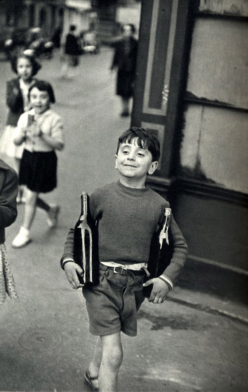 Henri Cartier-Bresson, Boy with wine bottles, France