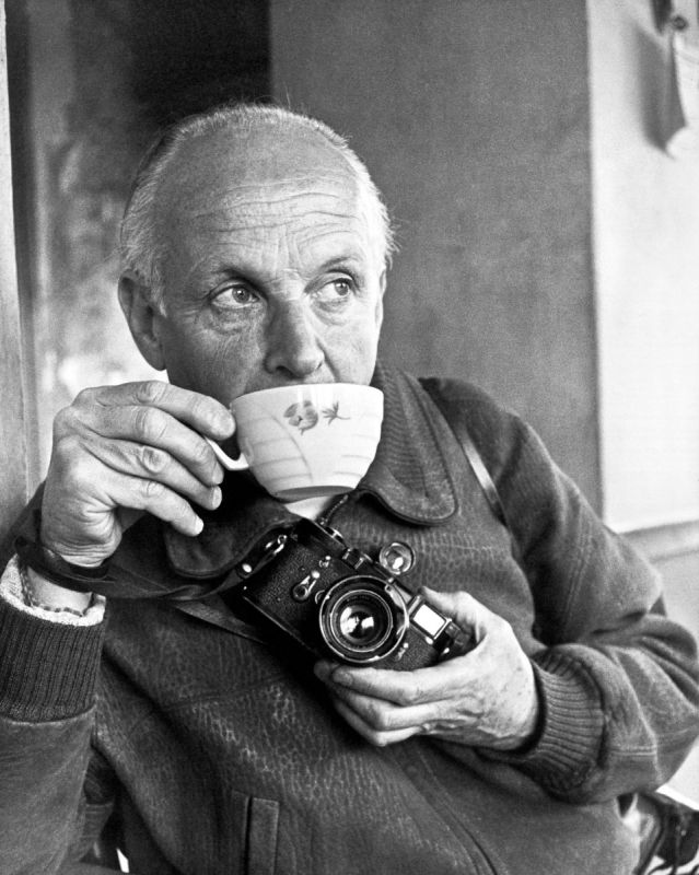 Henri Cartier-Bresson with his 35mm Leica M3 rangefinder camera