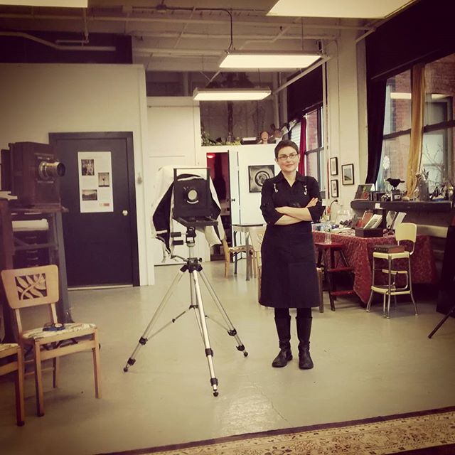 Wet Plate Collodion Photography at Genesee Libby Studio — Rochester-based artist Jenn Libby eyes up the group while her glass plate is sensitizing in a silver bath.