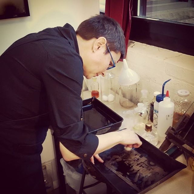 Wet Plate Collodion Photography at Genesee Libby Studio — Jenn fixing the plate after development.